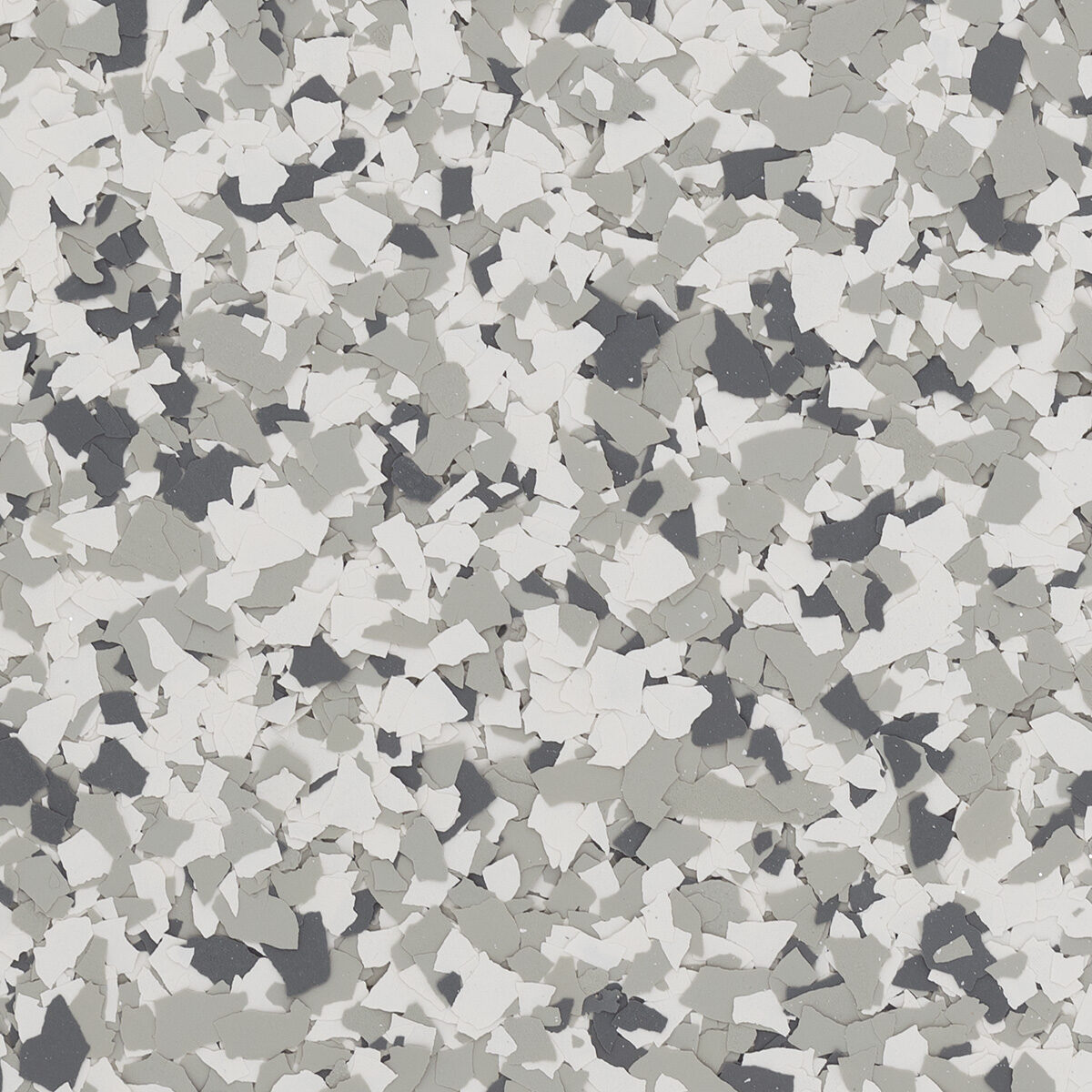 Snowfall flake blend spread across a floor: white and light gray